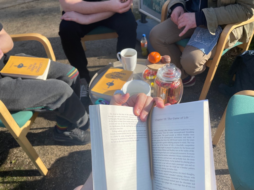 Members of RecoverReads meet to read their latest book together